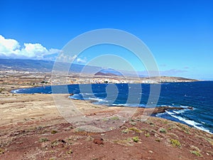 Panoramic view of desert coastal landscape with sea and blue sky. Deserts and extreme nature