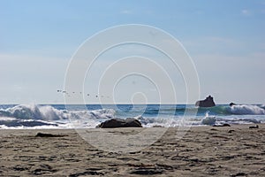 Panoramic view of deserted beach along the rugged coastline of Big Sur along famous Highway 1, Monterey county, California, USA,