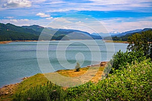 Panoramic view of Dexter Reservoir near Eugene, Oregon, with mountain backdrop