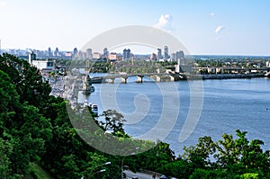 Panoramic view of district Podil and the Dnipro river in Kyiv. Summer afternoon