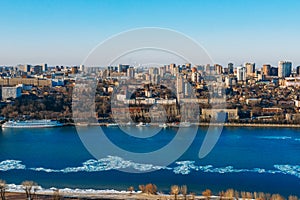 Panoramic view of Don river and right bank of Rostov-on-Don city with many buildings, Russian big city in winter time