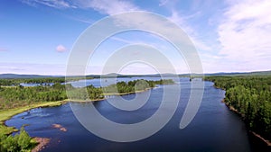 Panoramic view Drone takes off over a beautiful lake in the wilderness of Sweden.