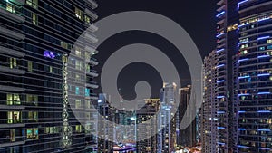 Panoramic view of the Dubai Marina and JBR area aerial night timelapse