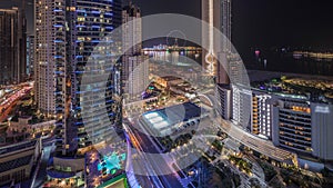 Panoramic view of the Dubai Marina and JBR area and the famous Ferris Wheel aerial night timelapse