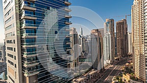 Panoramic view of the Dubai Marina and JBR area and the famous Ferris Wheel aerial timelapse