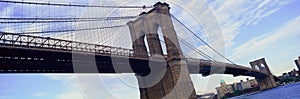 Panoramic view of East River and Brooklyn Bridge to lower Manhattan, New York City, NY