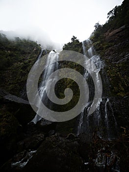 Panoramic view of El Chorro de Giron waterfall cascade cataract near Cuenca Azuay Ecuador South America photo