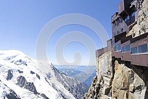 A panoramic view of European Alps on a sunny day. Mount Blanc as a highest mountain in Europe covered with snow and glacier