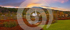 Panoramic view of fall foliage at Stowe Church in Vermont