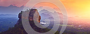 Panoramic view of famous ancient stone fortress Sigiriya Lion Rock on island of Sri Lanka.