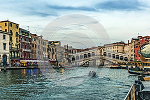 Panoramic view of famous Canal Grande from Rialto Bridge at sunset in Venice, Italy