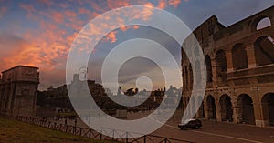 The view with the famous of the Coliseum or Flavian Amphitheatre (Amphitheatrum Flavium or Colosseo), sunset sky scene photo