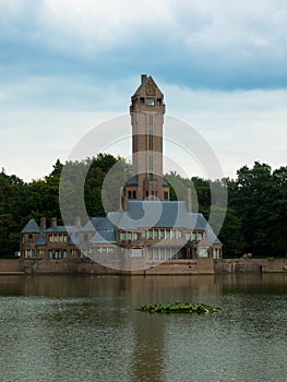 Panoramic view of the famous monumental hunting castle Jachthuis Sint-Hubertus in national park De Hoge Veluwe