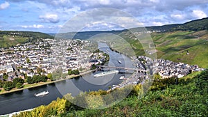 A panoramic view of the famous Mosel river overlooking the picturesque town of bercastel-Kues, Germany.