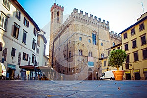 Panoramic view of famous Palazzo Vecchio, old houses and cobbled streets in Florence, Tuscany, Italy