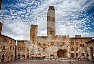 Panoramic view of famous Piazza del Duomo in San Gimignano , Siena, Tuscany, Italy