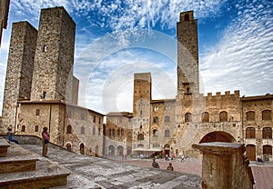 Panoramic view of famous Piazza del Duomo in San Gimignano , Siena, Tuscany, Italy