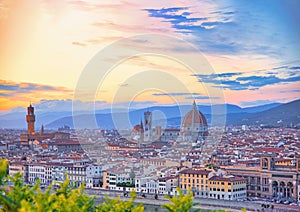 Panoramic view of famous Ponte Vecchio with river Arno at sunset in Florence, Tuscany, Italy. Panorama View of Florence / Firenze