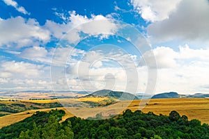 Panoramic view of farm fields, villages and hills, rural landscape