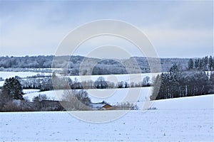 A panoramic view on the fields covered by snow - Walonie, Belgium