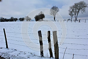 A panoramic view on the fields covered by snow - Walonie, Belgium