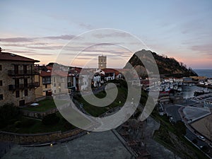 Panoramic view of fishing village harbour coastal town Getaria Guetaria on Urola Coast Gipuzkoa Basque Country Spain