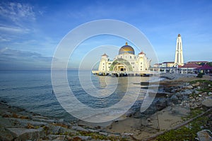 Panoramic view of floating public mosque during awesome sunset