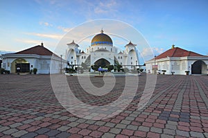 Panoramic view of floating public mosque during awesome sunset