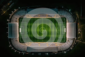 Panoramic view of foot ball or soccer arena stadium with grass field, spotlight for match, playground before game kicking, with