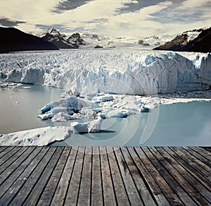 Panoramic view of the gigantic Perito Moreno glacier, its tongue and lagoon in Patagonia in golden Autumn, Argentina, sunny day,