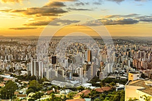 Panoramic view of golden sunset in city Belo Horizonte , Brazil . photo