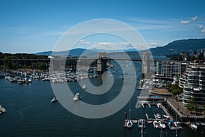 Panoramic view of granville island and  Burrard Street Bridge in Vancouver downtown