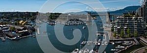 Panoramic view of granville island and  Burrard Street Bridge in Vancouver downtown