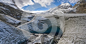 Panoramic view of the graphic details, textures and ice formations of the Athabasca Glacier