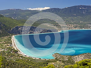 Panoramic view of the Greek village and the beautiful Psatha beach in the Corinthian Gulf of the Ionian sea in Greece on a Sunny s