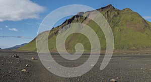 Panoramic view on green Hattafell mountain in Volcanic landscape behind Emstrur camping site on Laugavegur trek in area