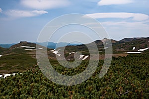 Panoramic view on green slopes around Mount Kurodake