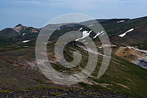 Panoramic view on green slopes around Mount Kurodake