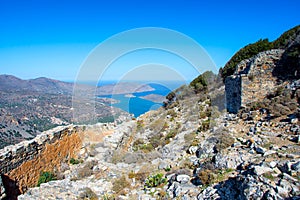 Panoramic view of the gulf of Mirambello with Spinalonga island. View from the mountain of Oxa with ruins of ancient water tanks.