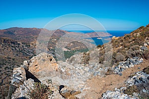 Panoramic view of the gulf of Mirambello with Spinalonga island. View from the mountain of Oxa with ruins of ancient water tanks.