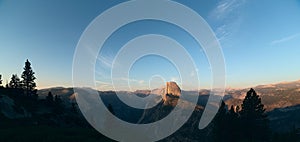 Panoramic view on Half Dome peak in sunset light from Glacier Po