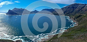 Panoramic view of the harbor of Hout Bay, Cape Town and Table Mountain