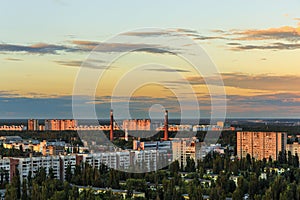 Panoramic view from a height or aerial view from roof top to sleeping areas of the city of Voronezh at sunset, cityscape