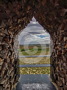 Panoramic view from the Helsheaven floating chapel in Helshoven on the rolling fruit tree landscape in Haspengouw area Belgium photo