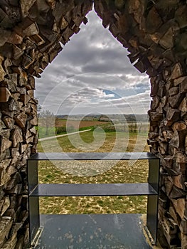 Panoramic view from the Helsheaven floating chapel in Helshoven on the rolling fruit tree landscape in Haspengouw area Belgium photo