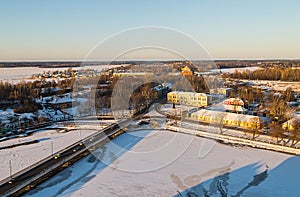 Panoramic view from a high point view of the Finnish bay ice-covered bridge car and home winter selection. Russia Vyborg
