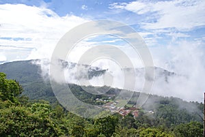 Panoramic view of hill ranges with mist