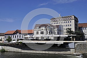 Panoramic View with Historic Buildings from Crisul Repede river bank of Oradea City in Romania.