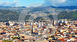 Panoramic view of the city Cuenca, Ecuador, with many churches photo