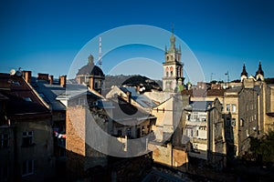 panoramic view on historical center with high tower and catholic cathedral in Lviv city